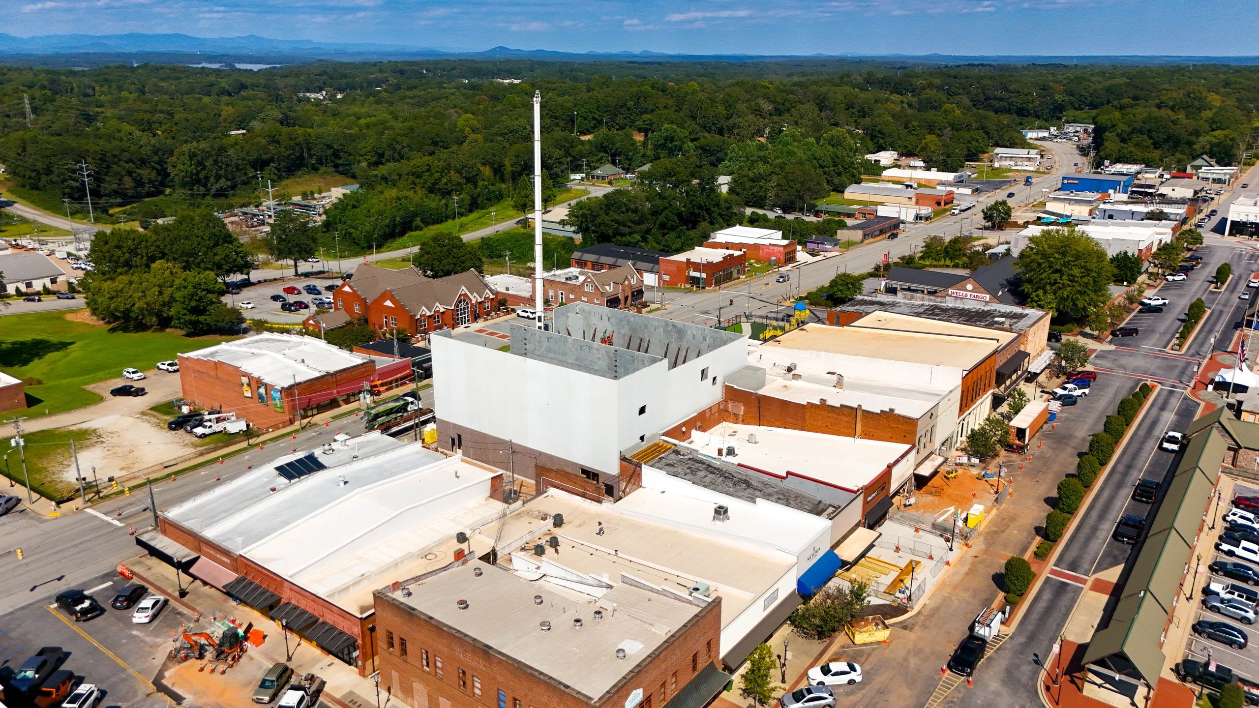 Aerial view of the Seneca Center for the Arts construction project and surrounding downtown streets.